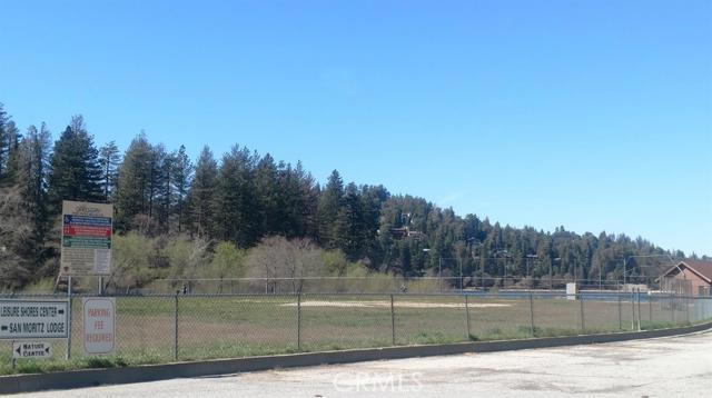 Location, Location, Location!!! Buildable Down Slope Lot In Prime Area Of San Moritz. Build Your Mountain Dream Home And Enjoy Fishing And Walks On The Lake Trail Right Across The Street From Your Home. Close To Lake Gregory Park, San Moritz Lodge And Walking Distance Into Town. For Those Wanting To Build, This Is A Must See!