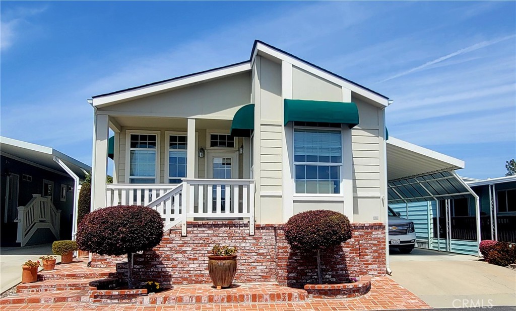 Ocean and dune views from your front porch, kitchen, and living room! Come see this beautiful jewel box. Light and bright, with an open floor plan, this well-kept home offers a move in ready beach bungalow. The primary bedroom, guest bedroom and office provide room for guests, hobbies, crafts, remote work, or whatever you can imagine. Granite counters, large windows and a cute breakfast area round out the cute kitchen. An adorable front porch welcomes you to the front door. Canvas awnings grace the windows. Wonderful back deck off the primary bedroom affords a quiet space to enjoy the outdoors. Outside, there is a great shed that provides tons of storage. This beautiful home won't last long.