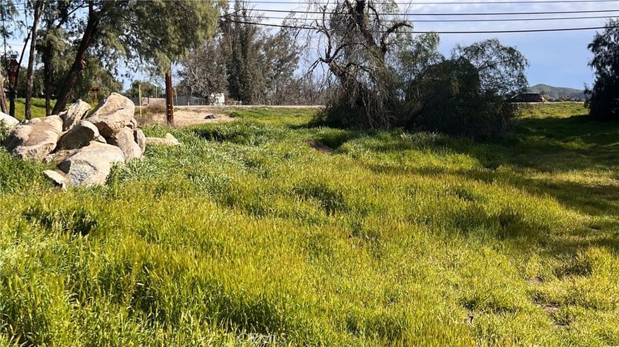 Presenting prime vacant land at Mountain Ave & Hwy 74, Perris, CA 92570. This corner lot, comprising two parcels totaling .37 acres (16,117 square feet) Boasts frontage along the bustling Highway 74 corridor. Positioned within the  Highway 74 Business Corridor Re-designation Plan, it's ideal for immediate development or as a strategic investment for future growth.