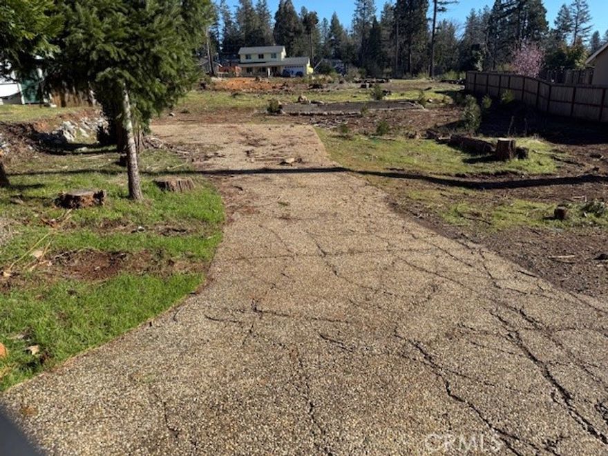 Welcome to your future retreat in serene Magalia, CA! This 0.23-acre lot presents a perfect blank canvas for your dream home. Nestled within the Paradise Pines Property Association, you'll enjoy exclusive access to a range of fantastic amenities, including a sparkling pool, BBQ facilities, and more, enhancing your lifestyle in this beautiful community. The neighborhood is designed for connection, featuring newly constructed homes alongside charming pre-existing residences, creating a warm and inviting neighborhood atmosphere. Embrace the tranquility of nature while being part of a vibrant community. This opportunity is not just about owning land; it’s about investing in a lifestyle. Don't miss the chance to turn your vision into reality—contact us today to learn more! Lastly, your insurance company will love this, fire hydrant right in front corner!