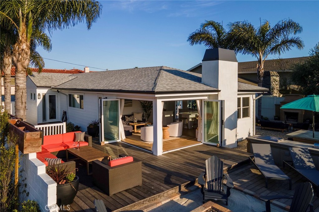 THE BEST OF BEACHSIDE LIVING!!! Nestled in the sought-after Lantern District of Dana Point, this coastal 2-bedroom, 2-bathroom home with separate casita is a rare gem for your holiday getaway. Embrace the coastal lifestyle with panoramic sunsets and ocean views that create an idyllic backdrop for entertaining and relaxation. The custom sand firepit, built-in grilling station, complete with Argentine/Santa Maria style grill, gas BBQ grill, gas griddle, gas burner, warming drawer and beverage fridge are a testament to the outdoor seaside living experience. Discover multiple outdoor living areas, outdoor fireplaces, and lush gardens that envelop the home, providing a serene and picturesque setting for your holiday retreat. Walls of glass open to the ocean-facing corner, evoking a feeling of a tranquil Island Lanai. The open kitchen is spacious and well-appointed, featuring quartz counters and brand new Thermador appliances. Unwind after a day in the surf and sand in the cozy living room, complete with a fireplace and captivating sit-down ocean views. The primary bedroom offers a beautiful ocean view from the bed, spacious walk-in closet and a luxurious walk-in shower with dual shower heads and newly renovated finishes. All the necessities of home are offered in this seasonal furnished rental: Four Seasons beds in the bedrooms, Sonos sound indoors and out, TVs, WIFI, washer & dryer, outdoor shower, Aquasana whole house water filtration system, Ping Pong and 2 electric charging stations in the 4 car garage! The driveway offers ample off-street parking with additional space for a boat or RV. With Salt Creek Strand Beach just steps away and the charming downtown area of Dana Point and its array of shops and restaurants within easy reach, the walkability of this location is unparalleled. Close proximity to top tier golf, world-class beaches and 5-star resorts at the Ritz Carlton and Waldorf Astoria, not to mention the Dana Point Harbor with a $400 million renovation underway. Don't miss the opportunity to experience coastal living at its finest in this remarkable escape. Permanent vacation is a reservation away! CALL FOR SEASONAL RATES & AVAILABILITY! Available September 2025 onward!