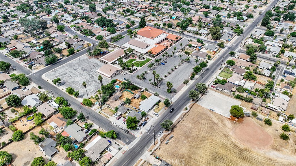 REDUCED! Unique opportunity to purchase 5.49 acres with in-place facilities in a desirable residential area of Hemet. Currently operating as a Church and Zoned S1, the site can utilize the benefits of California SB 4, enacted in 2023 that streamlines housing developments on certain properties and exempts them from environmental review. This applies to sites owned by either religious or educational institutions and must be 100% affordable housing. The law calls for the approval process to take place 90 days after application submission. Surrounded by R1 residential properties the site currently includes 5 buildings totaling 41,403 sf with parking for 223 vehicles and landscape improvements. The property has 296 feet of frontage to Buena Vista Street, 597 feet of frontage to Wesley Place, 230 feet of frontage to Thompson Street and 300 feet of frontage to East Mayberry Avenue with ingress and egress on all four streets surrounding the property. The site is mostly level and slightly above street grade. Existing improvements include planters, fountain, patios and concrete walkways and greenbelt with multiple structures.
The property remains an operating religious facility therefore all site tours must be coordinated through the listing agent in advance. There is no For Sale sign on the premises. Property is sold in As-Is condition. Visit www.600emayberryave.com