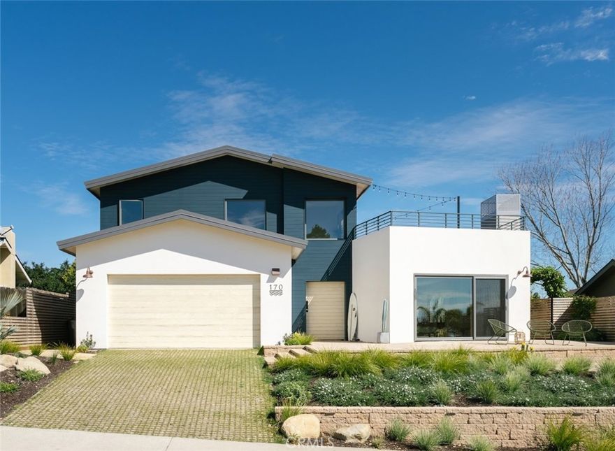 Welcome to Surf Street by PACK Design Group - a stunning coast-modern masterpiece perched several hundred feet above the Pacific Ocean with sweeping views of Pismo Beach and beyond. This bespoke Pacific Estates residence has been meticulously designed by acclaimed California designer, Jon Couch (Associate AIA) of PACK Design Group, and thoughtfully reconstructed from the ground up with completion in April 2025. This spacious two story home consists of three bedrooms, bonus den area, three full bathrooms, and an oversized rooftop deck with whitewater views. Upon entering the custom solid-wood pivot front door you are greeted by a cozy wood clad foyer that opens up to the living, dining, and kitchen. The ground floor also consists of a secondary bedroom suite, guest bedroom, den, laundry room, and two car finished garage with epoxy flooring. The vision of this home was to seamlessly integrate indoor and outdoor living with the usage of massive wood-frame sliding doors and windows that secretly pocket into the walls to completely disappear from your view. The result is a unique blend of thoughtfully crafted outdoor spaces merging perfectly into light filled indoor spaces. The entire second floor is an opulent private sanctuary featuring the primary suite and an attached 460 square-foot rooftop deck with ipe hardwood decking, gas burning outdoor fireplace, and dramatic views of the Central Coast. The landscaping around the entire site is inspired by the greenery found in Cornwall, England with coastal grasses, low line plants, and palms. The entire home is outfitted with top of the line materials and fixtures including: engineered white oak flooring, genuine Taj Mahal stone countertops, solid wood cabinetry, luxury smart appliances by Fisher & Paykel, Hansgrohe plumbing fixtures, Schoolhouse lighting, custom tilework throughout, ACX plywood clad foyer with custom peg-board wall, copper clad hood, recessed baseboards, level 5 smooth drywall, central heating & cooling system, genuine accoya wood exterior siding (50 year warranty), standing seam metal roof, extra insulation for efficiency & sound in roof/walls/flooring, contemporary wood clad windows by Weathershield, custom solid core pivot door with Fritz Jurgens hardware, new 200 electrical amp panel, new plumbing (pex + copper), new foundation, and more. This is truly one of the most architecturally unique custom home offerings to have ever publicly hit the for-sale market in Pismo Beach.
