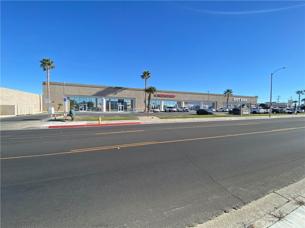 • The building is a concrete structure.
• The zoning is commercial.
• The tenant can be a retail or commercial user.
• Approximately 4,753 SF of Space is available for lease.
• The dimensions of the floor area are 43 feet in width by 110 feet deep.
• Ceiling Hight to bottom of dropped ceiling tiles is 14 feet.
• The building fronts Park Avenue which has retail and other commercial tenants.
• The Rear of the Building fronts on the I-15 Freeway.
• The front and rear of the building are mostly windows and glass doors.
• Signage on the freeway is available as well as the front of the building. Pylon signage ??? is also available.
• The two existing tenants in the 27,720 SF building are Boot Barn, that sells work shoes and _Cruz____ Truck parts that caters to truckers. Both tenants are destination retail tenants that do not generate much automotive traffic. Both tenants are on longer term leases.
• The parking ratio for the entire building 2.5 spaces per 1,000 SF. However, the two existing tenants do not require much parking.
• The building and parking area are very well maintained.
• The property is on the west side of the I-15 freeway.
• Access to the property is via Anacapa Road from either the Bear Valley Road Freeway interchange to the south and the Palmdale interchange to the north.
• The building is in the primary retail center for the High Desert which flanks both sides of the I-15 freeway from Hesperia, CA on the southern end to Victorville, CA on the northern end.
• The current population of the High Desert, which includes the 5 cites of Victorville, Hesperia, Apple Valley, Adelanto and Barstow, is approximately 450,000.