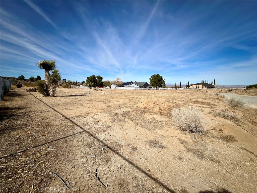 Just under one acre of vacant land perfect for you to build your dream home. In the community of Crystalaire near the private members only golf course and clubhouse amenities to include Golfing, tennis, pickleball, pool, dining room, fishing. Other nearby area activities such as camping, hiking, and a short distance to the Mountain High Ski resort. Water and power in the street. Bus routes available for students. Come take a look at all this area has to offer and build your dream home!