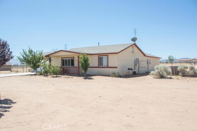 WOW! Home is priced right! This property sits on 1+ acre. It is on dirt road. Great for horse property or truck drivers. 3 bedrooms 2 bathrooms. Home needs some updating and has the room for it! It is close to the freeway and schools! Garage is converted into a storage/ play room.Come take a look! Association Amenities: None # of RV Spaces: 0NONE Frontage Type: Dirt Road Lot Location Type: Standard Location Special Features: None # of Attached Spaces: 2 # of Detached Spaces: 0