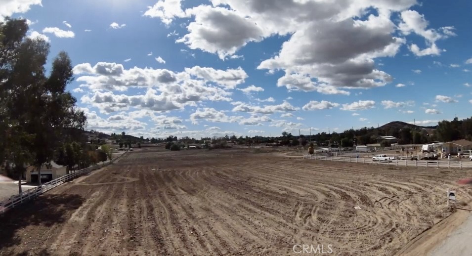 A beautiful 4.95 acres of flat, fully usable land zoned for Residential homes, horses, and agriculture - this property is perfect for a large compound project, Build your own family compound with the main home, ADU, a barn, pool, and workshops. Manufactured homes are allowed. Grow vineyards, groves & orchards. Enjoy the rural lifestyle of open spaces. It is situated at a location with a quiet rural setting, yet, is actually just minutes from the conveniences of town, with schools, restaurants, hospitals, and grocery stores, and just minutes from the 15/215 freeways, 79N/Winchester Road, Temecula Wine Country & Promenade Mall. Close to the Cities of Winchester, Murrieta, and Temecula. 9+ miles to Diamond Valley Lake, Lake Skinner, and Lake Perris. The Grocery Outlet is at Winchester and Thompson. A new development project called French Valley Commons with various retail stores is being built near Leon & Benton Road. The paved road on Leon leads to Loretta Road. You may install a well or connect to the city water on the street. The electrical is available with the power pole on the front of the parcel. Surrounded by rural properties as well as many new homes in a fast-growing area near French Valley. ATTENTION: Builders, Developers & Investors: The property is in the vicinity of the Riverside County Winchester Community Plan. (General Plan Amendment No. 1207). The Amendment will change the General Plan Foundation Component from Rural (R) and Rural Community (RC) to Community Development (CD), and amend the accompanying land use designations from Rural Residential (RR) and Estate Density Residential (EDR) to Density Residential (LDR), Medium Density Residential (MDR), Commercial Retail (CR), Business Park (BP), and light Industrial (LI). Highway 79 Policy is being revised and the Draft EIR for the WCP is complete and in the reviewing process. Seek the opportunity to purchase before the zone changes. (The buyer to advised to perform their own due diligence.) This property is less than an hour from Corona & Riverside, SD & 2 hours from LA, OC, Palm Springs, Lake Arrowhead, and Big Bear.