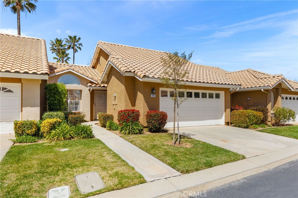 GREAT Location ~ Walk out your Patio Gate to Enjoy the Lakeside II Association Pool and Spa! This SAN JACINTO MODEL 850 SF 2 Br 2 Ba. condo looks out to a lush green area maintained by the association. This impeccably kept and sparkling clean and Inviting home features: Dining Area off Kitchen. Custom Light & Plumbing Fixtures; Hardwood flooring and self closing cabinets! Bright & Light Home with is located by the Lakeside Pool Area located just outside your Private Gated Patio. This model is maintained on the outside (painting, landscaping, watering of lawn area) by the HOA Association. Cable TV and high speed internet are included in your low HOA & no Mello Roos! Sun Lakes Country Club: TWO 18-HOLE GOLF COURSES with Pro Shops, THREE Clubhouses, TWO Restaurants, Bar & Lounge, 3 Swimming Pools (including indoor), jacuzzi, three gymnasiums, and great activities offered on a daily basis. There are 60+ Social Clubs - RV, Yoga, Dancing, Cards, Bocce Ball, Bowling, Car Club, Drama, Sewing, Tennis, Bingo, Travel, Quilters, Art League, Sewing, International Culture, Genealogical Society, Garden, Photography, Travel, and a lot MORE! Then if you are searching for more, there are the wonderful Excursions scheduled all year long. What a wonderful place to retire!