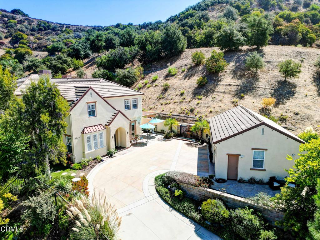 Reduced by $250,000 - priced to sell!This incredible view home is sited on a half acre lot with amenities that will please everyone plus a ton of privacy!The heart of this home is a fabulous great room with a fireplace, a chef's kitchen, walk-in pantry & a butlers pantry! The large formal dining room can accommodate your large dining table and has views & double French doors to the patio and outdoor kitchen! An elegant fireplace accents the formal living room that has views to the front of the property and to the main patio and the outdoor kitchen. Opposite the living room is a large office with double French doors that lead outside. There is an ensuite bedroom on the main level which is ideal for guests or those with mobility challenges.Up the beautiful sweeping staircase you come to a landing with lots of natural light. There are two ensuite bedrooms to your right and two secondary 'Jack & Jill' bedrooms, a full bath and a large laundry room to your left. The primary suite is impressive! A walk-in closet with natural light and a full wall of dresser drawers is adjacent to the primary bath complete with a jetted soaking tub, step-in shower & built-in dressing table. The grounds of this property provide stunning views to downtown Glendale & the Santa Monica mountain range! There are four inviting outdoor entertaining areas including a gas firepit & waterfall fountain. The 3-car detached garage offers many options such as a future ADU conversion. All Information is deemed reliable, but not verified. Listing agent/listing broker has not independently verified the information stated in this MLS listing and has either relied on public sources of data or the owner's representations. the information stated in the MLS about this property is not guaranteed. Buyer/buyer's agent are strongly advised to independently verify all information contained herein including but not limited to any numerical references to square footage, lot size, value of upgrades etc. Sale is As-Is. Call Linda for a private showing.