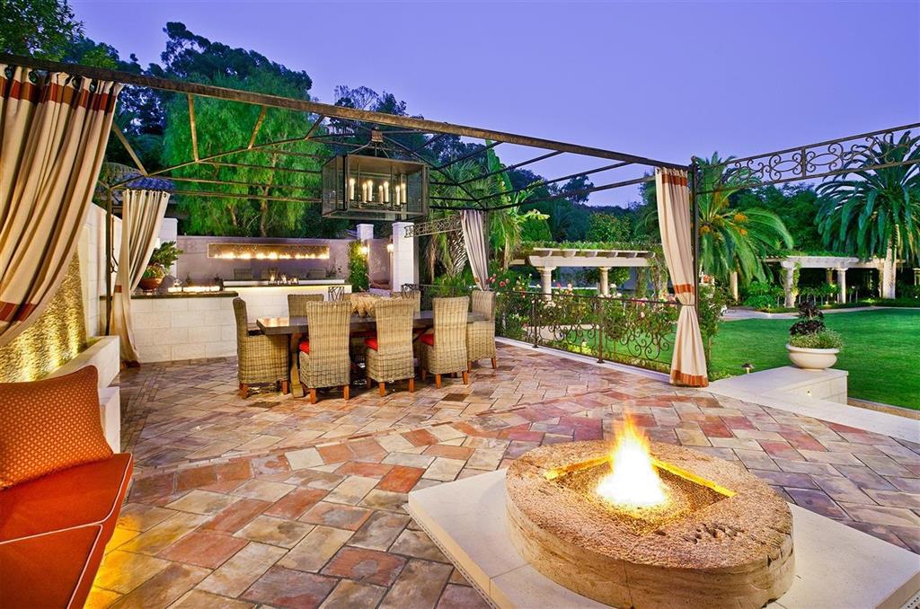 Entertain on a monumental scale at Casa Del Sol in Rancho Santa Fe. Hidden among 8 botanical-quality acres is a master-planned compound that includes six structures: main residence, guest home, Roman spa, staff quarters, fitness center, and loggia. Amenities overflow here as abundantly as the many exquisite waterfalls, fountains, and lagoons tucked away throughout this one-of-a-kind oasis. Neighborhoods: Covenant Equipment: Garage Door Opener,Pool/Spa/Equipment, Range/Oven Other Fees: 0 Sewer: Septic Installed Topography: LL