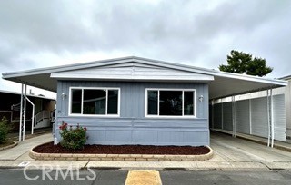 SUPER LOW PRICE !!! VERY Spacious Manufactured Home On LARGE lot with plenty of rooms. Completely REMODELED with all NEW APPLIANCES. 4Bedroom 2 Bathroom with a BONUS ROOM/Enclosed Patio with separate entrance. Grapefruit, peach and lime tree. A MUST SEE! All-age Family Park with clubhouse, playground, swimming pool and spa.