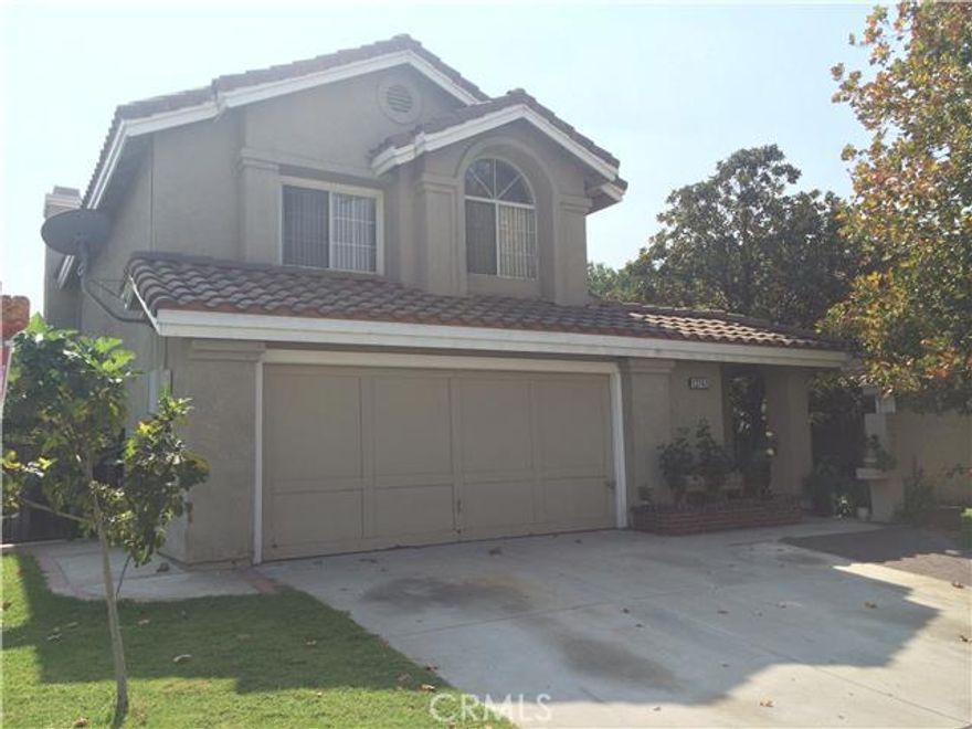 NO HOA FEES. Standard sale in the highly desirable Village of Heritage. 4 Bedrooms and 3 bathrooms with 1,857 square feet of living space.  Located in the highly desirable ETIWANDA School district. When you walk in to the house you notice the beautiful flooring, high ceilings and the open floor plan. The spacious kitchen has plenty of storage and it opens up to a breakfast nook and family room which features a fire place for those cold winters.  Features one bedroom and one bathroom downstairs.  Individual laundry room in the first floor.  After you go upstairs, the large master suite with a retreat area features big closets and dual vanity sinks. This home has an attached 2 car garage and a large backyard for entertaining with a custom built shed for storage.  This home also features solar panels for energy efficiency!