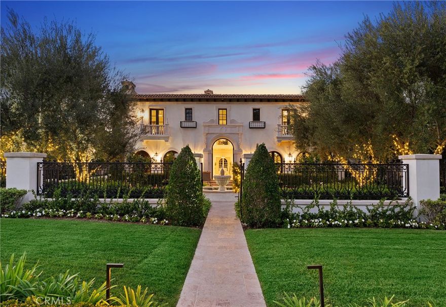 An enchanting estate fully reimagined inside and out behind the guarded gates of The Customs in Crystal Cove.

 Reminiscent of an Italian villa, the designer furnished 6 bedroom residence is situated on approximately 32,500 SF lot on a corner lot affording the home unique privacy. 

The home is approximately 12,234 SF and that does not include the 8 car garage and large loggia. 



Walk through the front gate and enter into your own enchanted garden with mature plants and trees. 

 Enter through a soaring glass front door to a stately romantic modern interior with Italian Calcutta gold marble slab floors throughout the home, including a stunning circular Calcutta gold staircase with solid brass railings to all 3 levels.



As you walk through the magnificent foyer to the artfully decorated living room, across the foyer is a fully paneled office with only the best of Artesian workmanship.  Going further to the family living space is the Chef’s kitchen – ready for entertaining!  Custom marble double islands, Wolf appliances and sub-zero refrigerators.



Stepping into the family room – coffered ceilings, wood floors, custom movie screen with surround sound system, stunning solid marble bar and sliding glass doors to a private loggia.



Equally impressive is the fabulous Primary Suite with custom moldings throughout.  The Primary Bedroom has a spa like retreat that you only dream of.



The lower level is the entertainment place.  Your movie theater has velvet upholstered walls with custom lighting with a fully integrated Savant stereo system throughout the home.  Impressive wine cellar for the true wine collector.



All this and so much more!