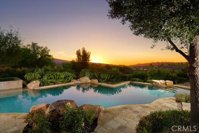 Panoramic views in this beautiful custom estate in exclusive Shady Canyon. 4 bedroom suites, 4 and 3 half-baths.