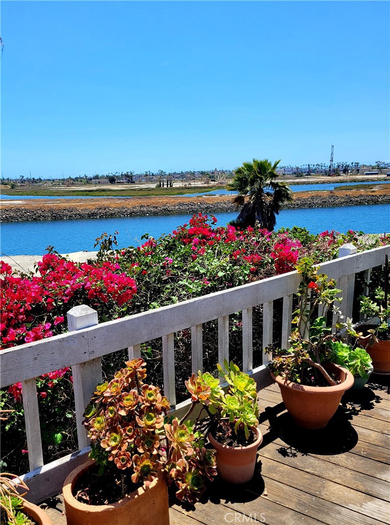 Welcome home to one of Long Beach's highly sought-after senior communities. This active 55 and older park is located within minutes to Belmont
Shore, Seal Beach, Golf Course, shopping and restaurants. Bring your hammer and paintbrush and make this house your home! The view from the deck is unforgettable! It boasts an open floor plan with a great room that is large enough for your dining area as well as your family room while being open to the kitchen. The great thing about this great room is that it has an amazing view from all the windows. Storage is abundant in the home as there are tons of cabinets in the kitchen, two pantries as well as a utility room filled with storage. The master suite has a large mirrored closet as well as a smaller mirrored closet all while having the master bathroom attached with additional storage. There is an inside laundry room that has a desk area tucked away from the living area. Speaking of storage, there is also a shed outside for all of your storage needs. This home truly is one of a kind with the gorgeous view and open living area. All it needs is some TLC. Park amenities include year round heated pool, spa, fitness center, billiard room, clubhouse & lending library. Accessed by a 24 hour attendant gate. Monthly space rent of $1,500.00 plus $42.39 gate fee, $21.06 trash fee and individually metered gas, electric and water. Buyers must obtain park approval to purchase.