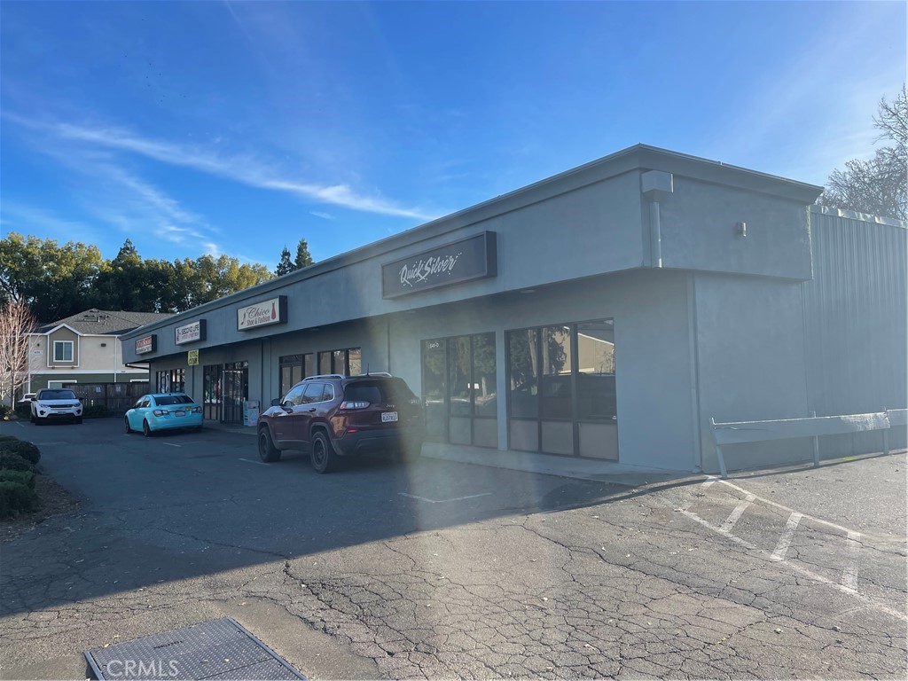 High vehicle count , 30 X40 open room with check out counter . Ready for next retail use .