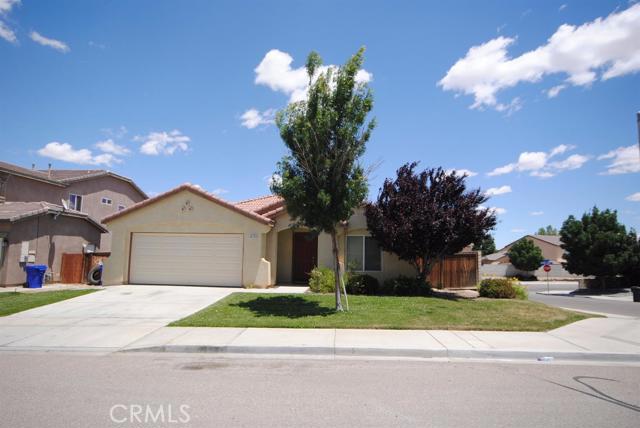 REMODELED Victorville home close to I-15 Freeway, shopping, schools and parks! This beautiful home has a large corner lot, block wall fencing, living & family room which has a fireplace, 3 large bedrooms, 2 full baths & indoor laundry. NEW 2 TONE INTERIOR PAINT, NEW CARPET, NEW WOOD looking floors and more! Covered patio which is fantastic for BBQ's. Association Amenities: None # of RV Spaces: 0 Special Features: PTRYNONE Lot Location Type: Standard Location # of Attached Spaces: 2 # of Detached Spaces: 0