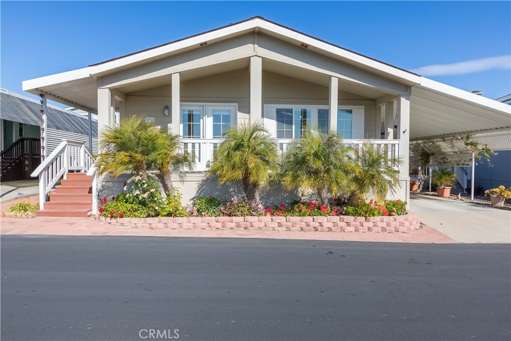 Fabulous home in one of the most sought-after locations in the park. This 2005 model offers one of the best views of the Pacific Ocean and dunes to the west. From the front porch you can peacefully take in the breathtaking sunsets. Views of the Pacific are visible from the living room as well. The roomy interior space comes with new flooring and fresh paint. The bedrooms and office/den are spacious, especially the master suite. The outdoor space is complete with a terraced sitting area and storage shed. This is the most popular senior park in the area with welcoming members who are eager to meet new friends. There is something for everyone in this park with activities ranging from a par 3 golf course, a beautiful pool and club area complete with a well equipped gym. This is a member owned park, which means you own the land. A park membership fee of $275,000 is included in the sale. Don't waste any time, it is rare a newer unit with a view this spectacular becomes available!