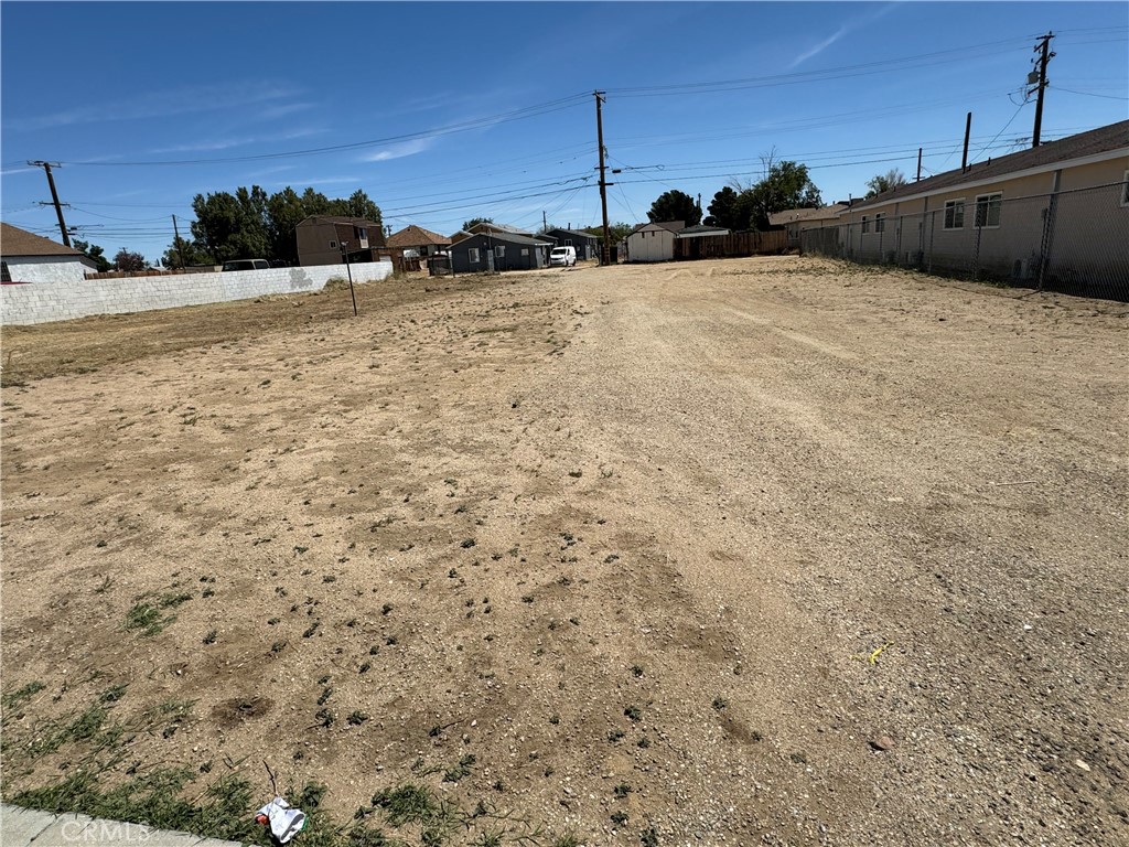 This vacant land is offered as a 7,573 sqft lots size located near California State Route 14 in the city of Mojave and minutes from the Mojave Air and Space Port. It is zoned for commercial mix use (buyer to verify with city/county). Neighbor property has multifamily units and has water and electrical utility. Located 50 miles east of Bakersfield and about 100 miles north of Los Angeles. Mojave is well known for its rural living with a rich Aerospace history. Also located minutes from local shopping centers and schools. Priced to sell!!!
