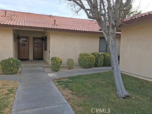 Enjoy your morning sunrises and afternoon shade on the covered patio. Golf frontage with nice pond view. Condo offer many upgrades. Even the patio is tiled. The photos will show you. Single level condo has two single car garages, with overflow parking just across the way. Fairway Court has private pool, spa and tennis courts. HOA dues for Fairway Ct $180 + HOA dues for SLA HOA is $188. Association Amenities: Beach # of RV Spaces: 0 Special Features: ,POOL,CLUB,SPA,SAUN,TENN,GYM,OSM,BEAC,GOLF Lot Location Type: On Golf Course Pool Features: Common Pool Special Features: Garage Door Opener, Underground Util: # of Attached Spaces: 1 # of Detached Spaces: 1
