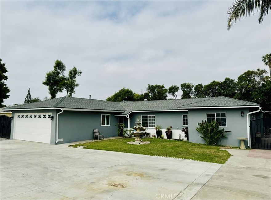 CHARMING....Turnkey Single Family Residence in Riverside.
 This spacious 4 bed/2 full bath home with Living room, Dining room, and Family room with Fireplace offers many upgrades including a beautiful, updated kitchen with New cabinets, Granite countertops, a large kitchen Island, Stainless steel appliances, Recess lighting, and lamps, flooring, and paint. bath also fully renovated.
Attached  2 car garage, and ample parking space for several vehicles. New roof replaced in 2021.4th bedroom has a separate private entrance making this a convenient space for family, guests, or even to Rent out separately.
the Large backyard is equipped with a Custom-made Rustic style Pergola and Bar ready for entertaining. Large storage shed also included.
Don't miss out the opportunity to own this fully fenced home close to schools, parks, shops, supermarkets, and so much more