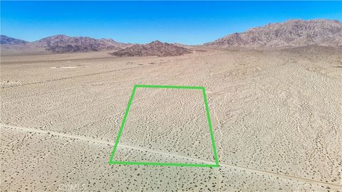 Photo of 592 Ironage Rd, 29 Palms, CA 92277 (MLS # JT24109700)