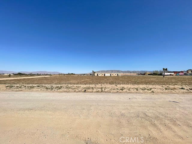 For sale: Corner lot 27,685 sf. Level land. Zoned Neighborhood Commercial. APN #0410-135-15. Close to commercial businesses on Main Street & G Avenue.