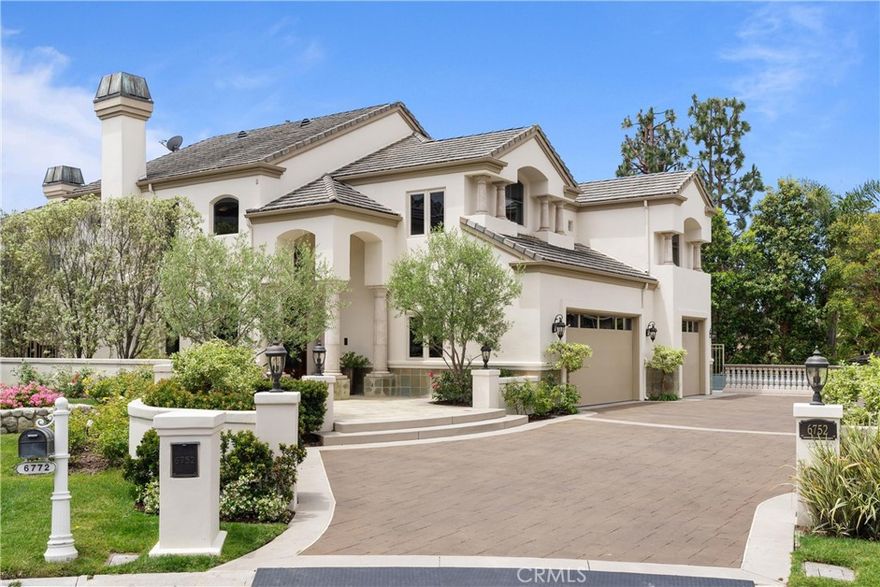 This custom-built home in the prestigious Edwards Hill neighborhood offers a rare combination of luxury, space, and privacy. Situated on a sprawling 15,300 square foot lot at the end of a tranquil cul-de-sac, it provides a peaceful, secluded retreat unlike any other in Huntington Beach. The oversized lot includes a private pickleball court, a sparkling pool with an exhilarating slide, a soothing spa, and a spacious firepit, perfect for entertaining or relaxing. Additionally, the property has direct access to an equestrian trail, ideal for those who love horseback riding. Inside, you'll find 5 spacious bedrooms, each with its own ensuite bathroom, along with 2 powder rooms. The 4,818 square feet of living space includes a dedicated office, a large bar for entertaining, and an open family room. The chef’s kitchen boasts a huge island, ideal for both cooking and socializing. Upstairs, there is a bonus room and a convenient laundry room. The outdoor area is designed for both comfort and convenience, featuring a built-in BBQ with a seating counter—perfect for al fresco dining. The oversized 3-car garage offers ample storage space, while the large driveway can accommodate 6 or more cars, ensuring plenty of parking for family and guests. This extraordinary home truly combines luxury living with the convenience of a rare, expansive lot in the heart of Huntington Beach.