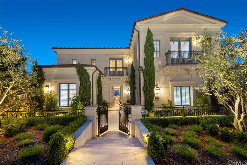 Designed by Robert Hidey Architects and constructed by The New Home Company, this 6,014 sq ft coastal estate graces a prime 23,183 sq ft expansive corner site punctuated by picturesque ocean, Catalina, harbor, coastline to Palos Verdes, and sunset views. A soaring two story foyer welcomes you to this immaculate, like-new residence encompassing 5 bedroom 6 full and one-half bathrooms. Sophisticated open living spaces framed by sliding glass doors open to the center courtyard and rear loggia, all perfect for year round entertaining and enjoyment. This refined estate offers a main level guest suite, office, great room, formal dining room with walk-in glass wine cellar, gourmet kitchen with separate catering kitchen, and an adjacent family room overlooking the award winning Roger's Garden lushly landscaped yard with built-in BBQ, fire pit and putting green. The second level offers a media lounge, three secondary bedroom suites; and the primary suite with luxurious marble clad separate his and hers bathrooms, beautifully appointed custom cedar-lined walk-in-closets, and viewing deck showcasing the expansive vistas. Other notables include a 4 car garage with epoxy finish, and solar panels. Crystal Cove is a 24 hour guard gated community. Residents enjoy access to the exclusive Canyon Club amenities, including swimming, fitness and tennis facilities, playgrounds, and close proximity to the shops and restaurants at Crystal Cove Promenade, the sandy beach at Crystal Cove State Park, The Resort At Pelican Hill and Golf Course and the region's most elite schools.
