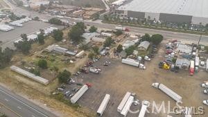 Perfect opportunity to own a 1 acre industrial property in a main transportation artery. Property is 43,800 sq feet )438 x 100).
The front 1/3 of the property has a 4 bd 2 bath home, a 3 bed 1 bath home and a duplex that has 2 1bed 1bath. The zoning is
corridor industrial within the Glen Helen Specific Plan. Close proximity to the 15 and 215 freeways. Corporate neighbors are
FedEx, CH Robinson, XPO Logistics and Tesla. The tenant is currently month to month. Seller will consider carrying with 35%
down. Call listing agent for more details.