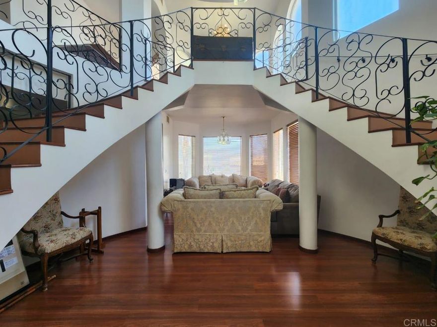 NEW PRICE! Value! Spacious and bright home for sale in an exclusive Ensenada gated subdivision. Upon entering the front door you will be greeted by an elegant double staircase that is the heart of the house, it has 4 bedrooms with closets and 4 full bathrooms. The master bedroom has a large walk in closet, full bathroom and a beautiful terrace. One of the bedrooms is on the first floor, with full bathroom, ideal for visitors or seniors. It has a foyer, living room, dining room, spacious kitchen with granite countertop and an island that is perfect for meetings where the hosts can interact with their guests. Additionally, it has multiple spaces such as a workshop for hobbies, 1 balcony to take the fresh air, large indoor laundry, storage, patio with barbecue and 2 garages, one closed and one under a pergola. Its garden is spectacular, with beautiful trees and plants that give a warm welcome to this beautiful property.  Located in the north of the city with immediate access to downtown Ensenada and the 10th street which joins the exit to Tijuana via the Ensenada-Tijuana Scenic Highway.  Close to schools of all levels, supermarkets, banks, restaurants, cafes, hotels and various businesses. Privada Chapultepec Segunda Sección has a 24-hour security booth with security cameras, guards and strict access control. Equipment: Cistern with hydropneumatic pump, and air conditioners in some areas. Stationary tank and everything necessary for its operation.  Only 3 minutes from downtown Ensenada, 30 minutes from Valle de Guadalupe, 1 hour 15 minutes from Tijuana and 1 hour 30 minutes from the US border.