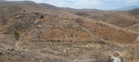 Photo of 0 Cajalco Road, Corona, CA 92881 (MLS # IG24002297)