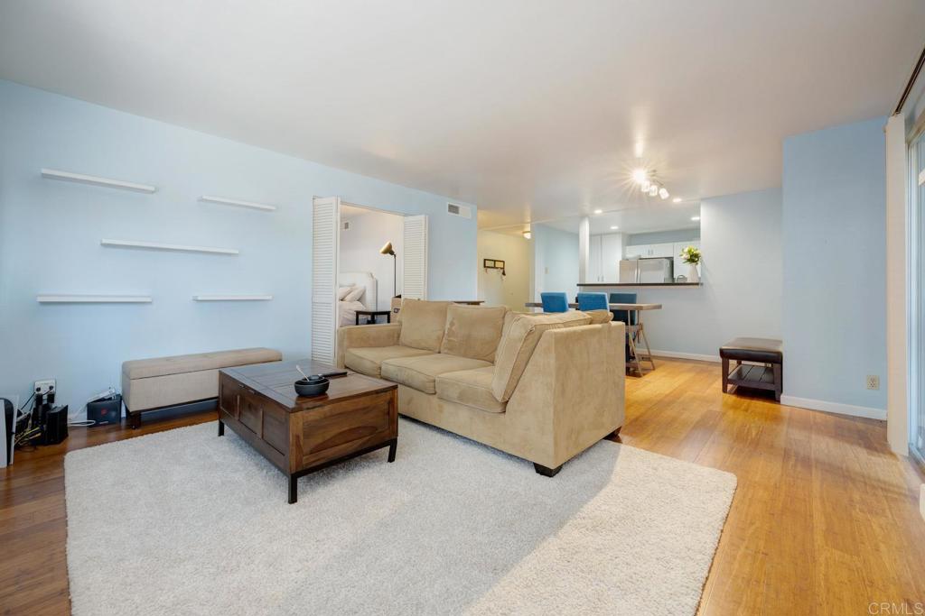 This first floor, 2 bedroom, 2 bathroom condo, conveniently situated in Mission Valley, offers easy access to the new Snapdragon Stadium. Explore the stunning contemporary kitchen, which underwent a refreshing renovation in 2020. The living room is enhanced by a cozy fireplace and sliding doors that lead to a private balcony. This unit boasts ample storage options, including three hall closets—a linen closet, one equipped with a sink for a wet-bar, and another with washer/dryer hookups. Additional storage is available in a closet off the balcony, along with a generous walk-in closet in the master bedroom. The air conditioning unit was recently replaced in 2020. Conveniently, you'll have an assigned carport parking spot directly beneath the unit and an unassigned parking spot with an HOA-issued permit. Community amenities encompass a refreshing pool and spa, tennis courts, a well-equipped gym/fitness center, a clubhouse, outdoor grilling stations, picnic areas, and common laundry facilities.