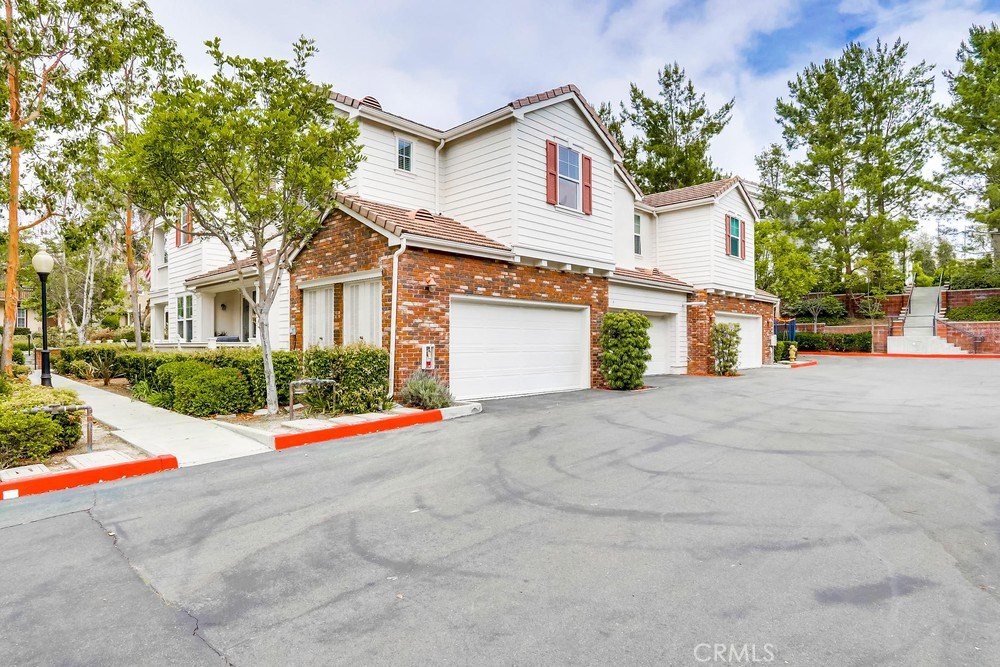 Fantastic location. Watch the Ladera fireworks from your front porch or balcony. Spacious and open floor plan with Travertine flooring throughout first floor. The living-room features a cozy gas fireplace with granite stone. The light and bright kitchen has lots of storage and counter space. The master suite is oversized and features a large balcony. The ensuite master bathroom has separate tub and shower, dual vanities and large walk in closet. Secondary bedrooms are spacious with ceiling fans and recessed lighting. The laundry room features extra storage. The home has an attached 2 car garage. High speed internet included in HOA fee. Enjoy the Ladera Ranch amenities including 12 pools, tennis courts, jacuzzi, miles of trails, climbing wall, community garden, water park, dog park, sand volleyball and much more. you’ll be walking distance to the clubhouse and community amenities. Zoned and walking distance to the award winning elementary and middle schools.