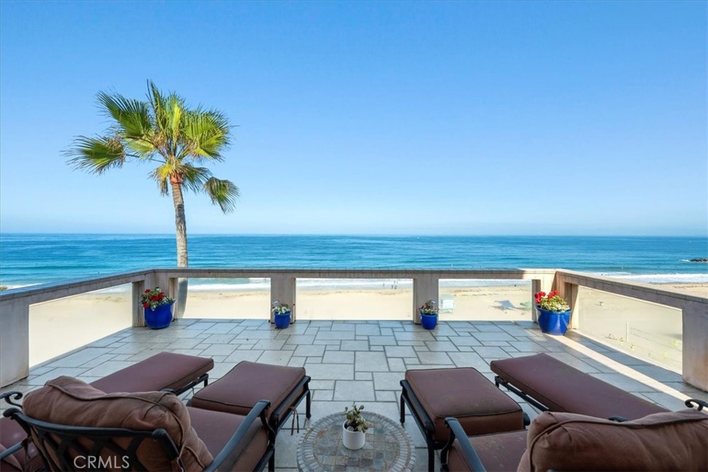 Very rare, oceanfront single-family residence on the West side of Esplanade boasting panoramic views of the coastline from Malibu to Palos Verdes. Step into the entry level to breathtaking ocean views, a beautifully designed custom kitchen, a cozy living room with fireplace and a large balcony perfect for chasing sunsets. On the top level, you'll find an office with an East-facing balcony and the primary suite offering spectacular ocean views. The lower level of the house features two additional bedrooms, a laundry room, and a separate living area along with private access to the beach ideal for hosting gatherings. This three-level home presents the potential to effortlessly create separate living quarters, complete with individual entrances, kitchens, bathrooms, and living spaces. Situated in a spectacular location of South Redondo, this property is conveniently close to The Riviera Village, restaurants, shopping, parks, and Redondo Pier. There are only 9 single family homes on the West side of the Esplanade and this is one of them, marking its first time on the market since 1977!