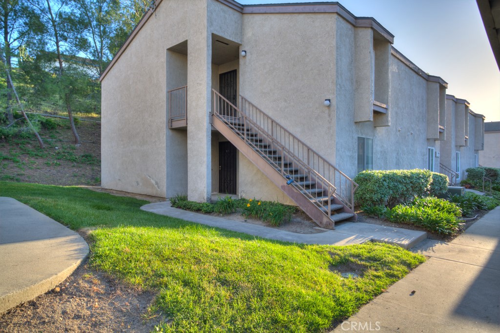 This beautiful ground floor (no stairs!) & end unit condo has been thoughtfully updated and offers hillside views from the private backyard.
Step inside from the front landing to find new luxury vinyl plank flooring, fresh paint and lots of natural light. The kitchen features granite countertops, ample cabinet space and a breakfast nook. Just steps from the spacious living room, you can grill up dinner or enjoy morning coffee on the covered back patio. The backyard is completely fenced in and there’s space for your garden and a pet play area.
The bedroom includes a generous walk-in closet, while the updated bathroom boasts a granite-topped vanity & a step-in shower with a glass door. The condo also offers bonus storage space off the patio and a single covered parking space in front of the building.
Hacienda Pines is a gated condo community where residents enjoy amenities like a pool & spa, two tennis courts and beautifully landscaped grounds. You'll be just a few blocks from the Schabarum Regional Park, and there are numerous shopping centers within 5 mins of your front door. Hop on the 60 Fwy in no time!