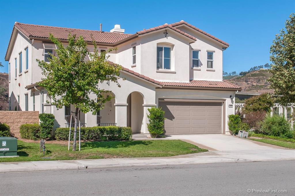 Large gorgeous home which owners have meticulously maintained. Light bright open floor plan just shy of 3000 SF with 5 beds, 1 optional, 3 baths, and spacious loft. This model features 2 beds & a full bath downstairs. Excellent location with no homes on three sides, open space behind, in front, and park like area with gazebo to the north. Enjoy beautiful views of rolling hills that surround this home. Community offers walking trails & tot lots, easy commute to I-15 & HWY 76 - Bonsall Schools. Neighborhoods: Lake Rancho Viejo Equipment: Fire Sprinklers,Garage Door Opener, Range/Oven Other Fees: 0 Sewer: Sewer Connected Topography: LL,RSLP
