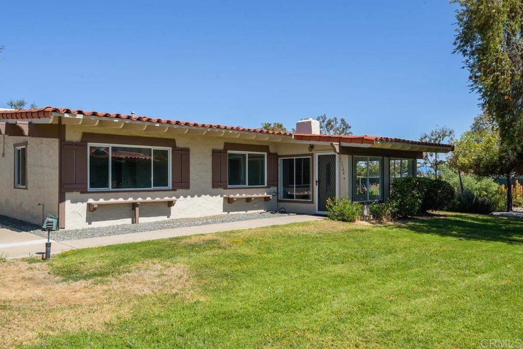 Price Range- 449,000-489,000. 55+ Community. Great Single Story Condo with an open floor plan in The Seven Oaks Community. Dual pane windows throughout with AC as well. End unit with only one shared wall. The condo is surrounded by grass, beautiful plants and you can see the hummingbirds right outside your window. Condo has assigned covered parking as well one or two additional parking spots. The laundry room is located behind the carport and also has room for extra storage. This condo is perfectly located close to the community center, shopping, restaurants and the freeway. Just about everything you will need is within a short walk or drive.