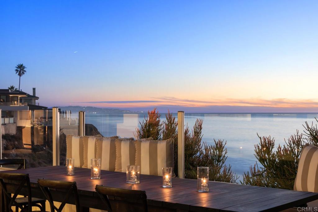 Have you ever dreamed of waking up to the sound of waves lapping the beach with nothing but the Pacific Ocean between you and Hawaii? An exquisite seaside lifestyle awaits you at this airy and light-filled home perched above Tide Beach on the bluff in Solana Beach. This gorgeous home, one of only five bluff homes above Tide Beach, could never be replicated today, with its 75-foot coastline plus a lush private garden with a 42-foot saltwater pool tucked behind the entry gate and hidden from the street. Sweeping French doors and windows bring breathtaking ocean views, natural light and air into every room and allow you to entertain guests indoors and outdoors. Enjoy al fresco dining on your oceanfront veranda with panoramic views from Carlsbad to La Jolla. Features a chef’s kitchen, high-end European finishes, top-of-the-line appliances, 3 spacious en-suite bedrooms and 3.5 bathrooms. Just steps away from Fletcher Cove, Cedros Design District, Solana Beach train station, and the shops and restaurants along Hwy 101.