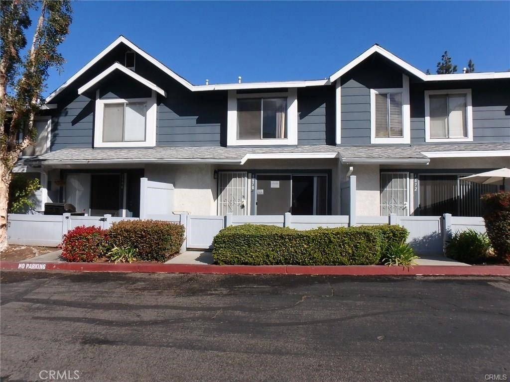 Beautiful remodeled townhome within the beautiful and highly desirable Solana Park gated community. Excellent location just across from Tokyo Central Plaza. Front patio welcomes you to this beautiful town home with brand new laminated woodflooring throughout. New fresh paint. 2 car attached garage with direct access to the inside of home. Inside laundry for dryer and washer hookups. Central air. Plenty of guest parking. 2 private pools for your enjoyment. Hurry, this home will go fast.
