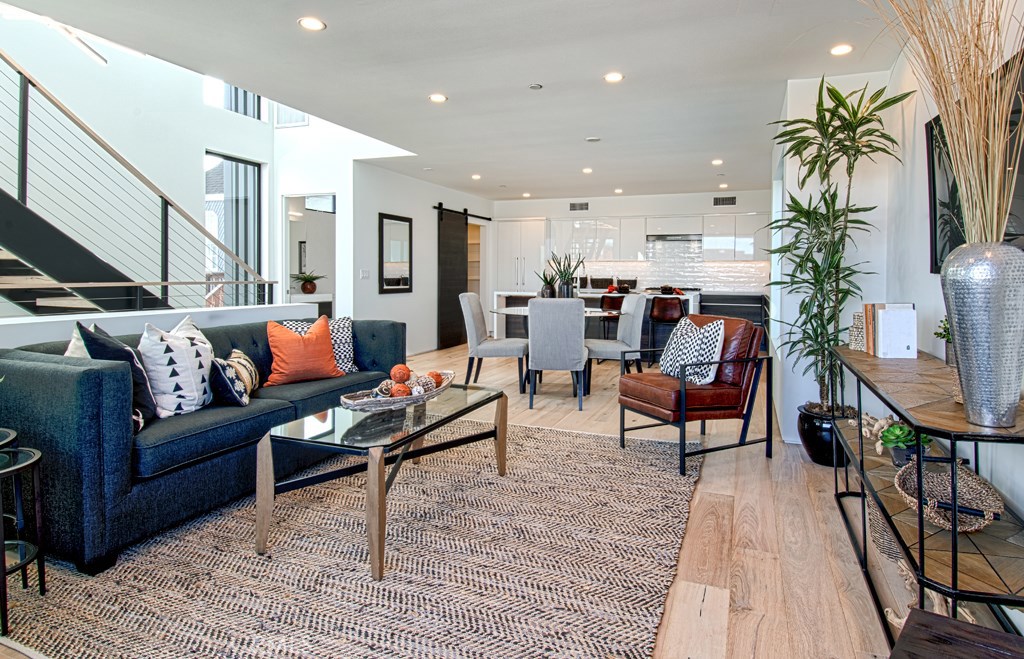 Available Furnished or Unfurnished - Can be a Monthly Summer rental or longer term 3-6+ months. Inquire for pricing. This is your opportunity to live in a magnificent new home on Balboa Peninsula. Just completed in August 2019, this home features clean lines, abundant natural light, and soaring ceilings. The main living level is spacious and inviting, and the over-sized roof deck is perfect for entertaining or private relaxation. Ideally situated between the iconic Balboa Fun Zone and the newly developed Marina Park, Lido House Resort, and many surrounding shops and restaurants, you will love the lifestyle this home provides while being only one house from the sand and surf.