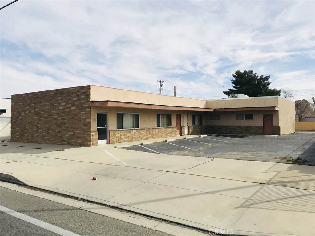 Office building plus warehouse with rollup door. Currently demised into four offices. All tenants are month-to-month.