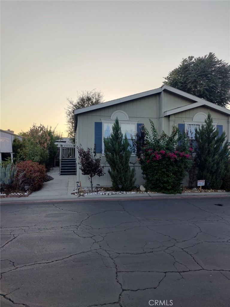 Welcome to a gated all age community of Silver Creek Mobile Home Community Park. The home features modern interior with 3 bedrooms and 2 bathrooms. Built in 1997 with approximately 1,633 square feet, has lots of windows for natural light and high ceiling in the living room area. Kitchen has been remodel with granite countertops and many white cabinets , restroom has also been remodel with modern tile , benefits also from a spacious laundry room with many cabinets for washer and dryer hookups. Enjoy this home from planted organic trees, avocado, Lemon, fig, mandarin and much more. Silver Creek Mobile Home Park residents, also benefit from various on-site amenities, including clubhouse for social gathering, a swimming-pool , and fitness center. As well, a secured gated entrance. The location of Silver Creek Mobile Home has significant advantages, has easy access to major highways, shopping center, and dinning areas. Don't miss this opportunity to experience comfortable living, contact us today to schedule a viewing and make this your new sweet home!