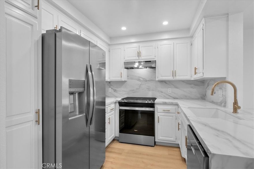 Welcome to 8601 Falmouth Ave #418, a highly sought after top floor unit in the beautiful Villas Del Rey.  The spacious, light and bright living area has soaring ceilings and a gas fireplace.   The living room leads out onto the west facing balcony through large sliding doors, and has sweeping views over the swimming pool and the tennis courts.  The large bedroom has a walk in closet on one side and a walk through vanity area on the other side which leads to the bathroom.  The bedroom also has sliding doors leading out onto the balcony.   Down the hall is the in-unit laundry area with brand new washer and dryer, and a guest bathroom.  The kitchen includes all new stainless steel appliances and features a waterfall countertop and breakfast bar.  Some of the recent updates include recessed lighting with dimmer switches, new luxury Vinyl Plank flooring, quartz countertops and a fresh coat of paint.  The tandem two car parking spots are right at the entrance to the foyer and the elevator.  Also just steps from the elevator in the garage is the secured storage room with its own large enclosed storage space.

The Villas Del Rey Complex amenities include the beautiful community swimming pool and spas, tennis courts, gym, saunas, clubhouse and covered guest parking spots.  

Conveniently located near LAX, shopping, top rated schools, beaches, restaurants, coffee shops, bars, the bike path and the future campus, Lulus Place.