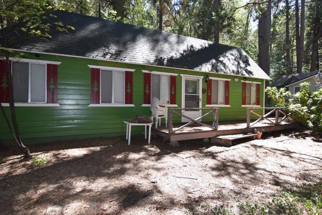 A cottage set way back off the street with a foot bridge that crosses a creek to get to the cottage. This levelish lot has great parking right off the street. Level entry with 2 bedrooms and two baths. No stairs in this one accept for the attic were a hide out for kids would be perfect. It is right next to Blue Jay shopping center so it's easy walking to all the shops yet it is divided by a large block wall that gives the home privacy and seclusion. Professional Photos to come. (Seller is still taking stuff out and cleaning up)