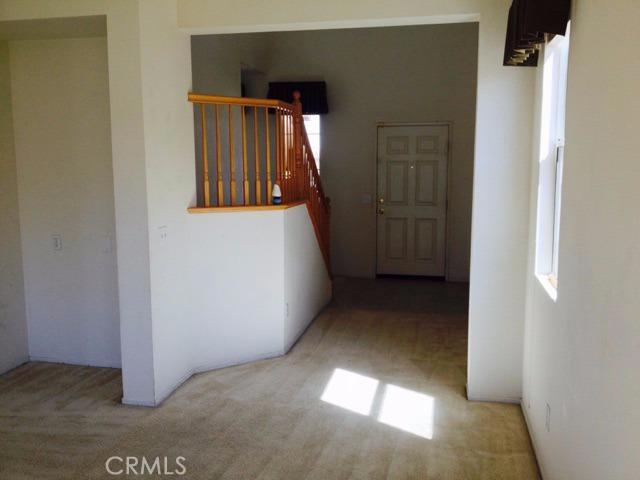 MOVE-IN READY! Large 2 story home located on a Cul-de-sac. New interior paint. 2200 Sq. Ft., 4 BD, 2.5 BA, built in 2002. The kitchen is open to the family room. Home has lots of kitchen cabinets and full size pantry. Family room has a nice fireplace. Laundry is conveniently located upstairs. Master bath has separate shower, tub and dual sinks. Hall bathroom has shower and tub combo. Half bathroom down stairs. Rear yard offers professional landscaping, with combination turf, covered rock, concrete curbing and auto sprinklers, huge covered patio in rear of home provides afternoon shade and backyard fencing. Home is close to Hwy 395 for easy freeway access. Close to shopping, schools and churches. Association Amenities: None # of RV Spaces: 0 Special Features: ,NONE Lot Location Type: Standard Location Special Features: Garage Door Opener, Underground Util: # of Attached Spaces: 2 # of Detached Spaces: 0
