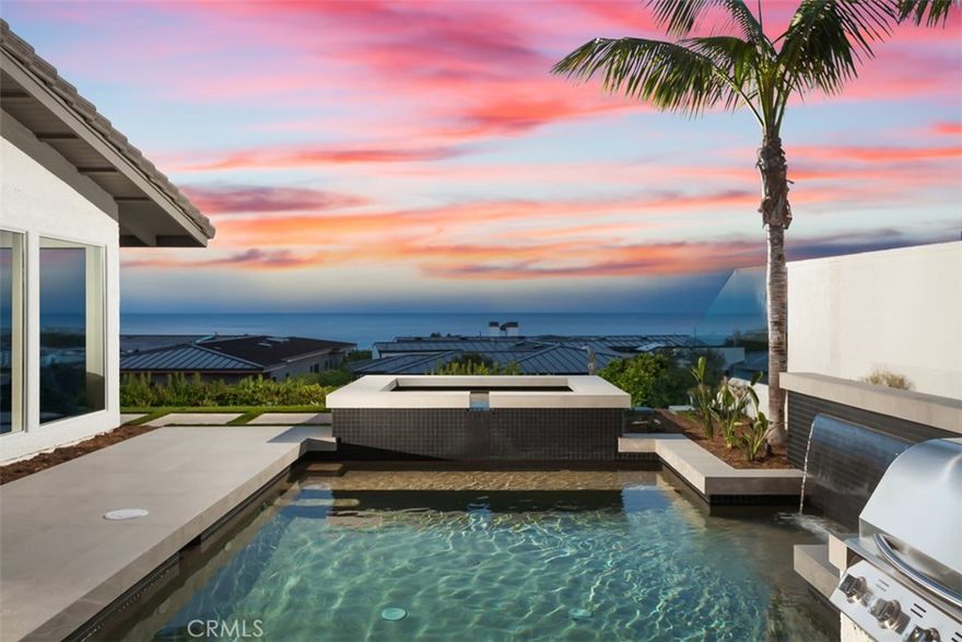 Located on one of the most premier panoramic ocean, Catalina and jetty facing view lots in Cameo Shores. 4533 Perham offers stunning views that can be enjoyed from nearly every room and center courtyard in this newly reimagined designer residence. An open floor plan invites guests to easily transition from the kitchen, family room, and outdoor living spaces highlighted by high-end finishes including French oak flooring, custom-milled cabinetry, and honed quartzite countertops. The gourmet kitchen is complete with chef-grade appliances, including a Wolf range, built-in espresso/coffee maker, and SubZero refrigerator. Oversized windows found in each room allow for an abundacne of natural light to flood every corner of the home, creating a tranquil ambiance complemented by the sound of crashing waves and the fragrance of ocean air. A gorgeous oversized walk-in closet is completed with a center island, custom built ins, and designer lighting fixtures reminiscent of the world&#8217;s finest showrooms. An oversized and private outdoor area that is rarely found but highly sought after in Cameo Shores allows for large scale celebrations and intimate gatherings alike - complete with pool & spa with matte glass designer tile, swim up bar, outdoor BBQ/kitchen area, outdoor dining loggia, and multiple seating areas. Residents of this exclusive enclave enjoy direct private access to Cameo Shores Beach.