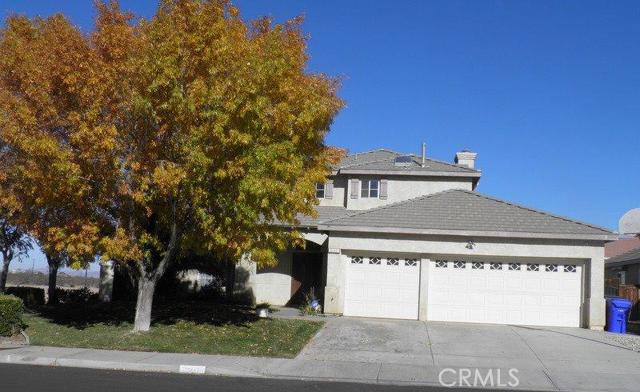Gorgeous corner property in a desirable area of Eagle Ranch in Victorville. Cathedral ceiling, 24x24 custom tile floor, Granite counter, stainless steel appliance, lots of cabinetry in the kitchen. Master bedroom has an area for retreat and double fire place. 400 sq ft enclosed addition (permitted)on the property and sole being use for Jacuzzi (included) that fits 6 people. 1 Bedroom downstairs and can be use as an office, 4 bedroom upstairs. A lot more upgrades in the property that you need to see. Association Amenities: None # of RV Spaces: 0 Special Features: CC,,PTRY,WSEC,SK,SHNONE Lot Location Type: Standard Location Special Features: Garage Door Opener # of Attached Spaces: 3 # of Detached Spaces: 0