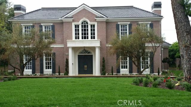 This English mansion is a glimmering gem, nestled in the prestigious Santa Anita Oaks..Another great work of Richard Smith Development, Dream Home LLC and Robert Tung, this impeccable estate stands out as one of Arcadia's finest..This house boasts generous use of marble, granite, travertine, wrought iron, crystal and solid hardwood..Upstairs, there are 3 spacious bedroom suites, exercise room with sauna and master suite with retreat.. Downstairs has another master suite and a suite, powder room and home theater.. Custom designed crystal chandeliers glitter through out the entire house.. Some amenities include an elevator, mirrored exercise room, sauna room, 5 zoned A/C, library, wine cellar, gourmet kitchen, a wok kitchen, outdoor BBQ kitchen, 6 security cameras integration systems, cable ready, central vaccum and home automation system..The center piece of this home, however, is swimming pool and outdoor entertainment center.. There are three 8' tall and 6' wide water falls and streams flowing down into the pool.. More impressive are two 8' by 6' 3D retractable screens in swimming pool..There is another home theater inside and a sound system that extends through out the entire house.
