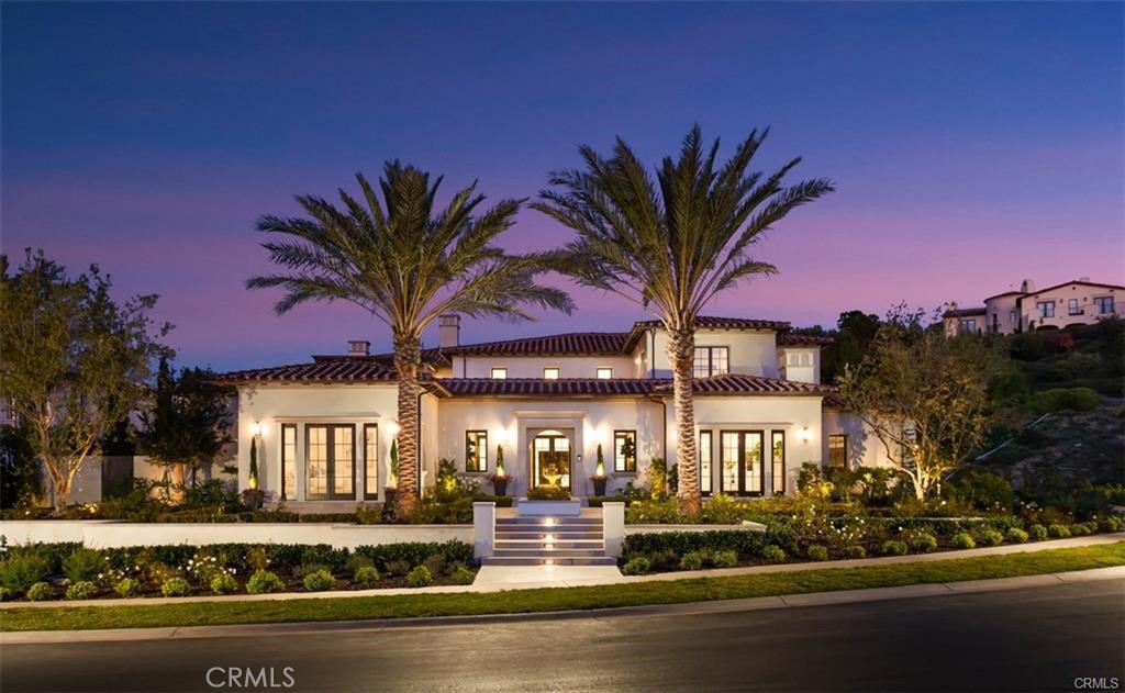 Exceptional architecture meets exquisite soft contemporary design elements; 36 S. Sur is newly built on a flat lot and located in the ultra exclusive and highly sought after guard gated community of Crystal Cove. Guests are greeted by an oversized private courtyard leading them to a grand entrance with dual marble wrapped floating staircases, unveiling a truly remarkable transitional masterpiece. The modern interior sets the stage for elevated and elegant everyday living while allowing for large-scale gatherings highlighted by soaring ceilings and ideal in-door/out-door living right to your own private resort style backyard. The magnificent great room is both dramatic & inviting as it blends seamlessly with the outdoor loggia through a large set of pocketing doors. The gourmet kitchen features two islands with bar seating & professional-grade appliances, while the formal living and dining rooms feature stone-clad fireplaces & built in custom cabinetry. The first-floor suite can serve as a junior master bedroom. There's also an extra media room that can be easily converted into a 6th bedroom. Upstairs, the sumptuous master suite offers a bar, seating area, an extraordinary bathroom and dual walk-in closets. Three generously sized guest suites complete the 2nd floor with a feeling of grandeur and opulence at every corner. Additional highlights include a smart home system, main level junior master suite, game room, pool & spa, multiple outdoor fire pits, BBQ & 4 car garage. This estate is completed w/ world class shopping, dining, & entertainment just down the road at the Crystal Cove Promenade.